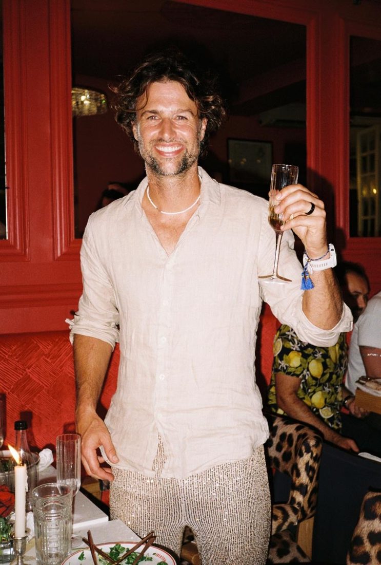 A guest raising a glass
